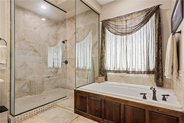 1981 Trophy Elk Ave, Logandale, NV 89021 - full bathroom with a shower stall and a bath