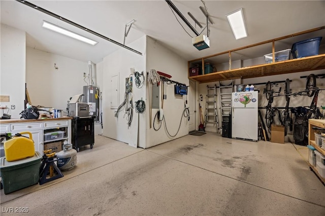 1981 Trophy Elk Ave, Logandale, NV 89021 - garage with gas water heater, freestanding refrigerator, and a garage door opener