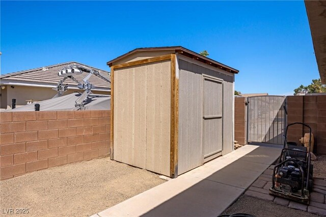 1981 Trophy Elk Ave, Logandale, NV 89021 - view of shed featuring a gate and fence
