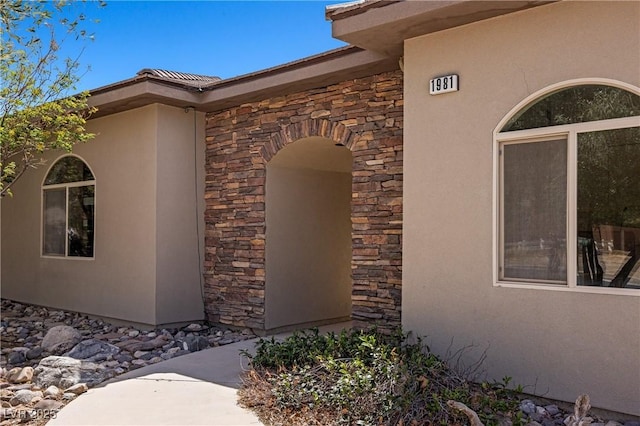 1981 Trophy Elk Ave, Logandale, NV 89021 - doorway to property with stone siding and stucco siding
