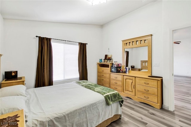 bedroom featuring light wood-style floors