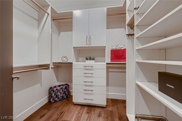 917 Vegas View Dr, Henderson, NV 89052 - walk in closet featuring wood finished floors