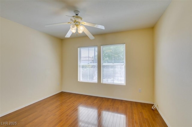 2078 Joy Creek Ln, Henderson, NV 89012 - unfurnished room featuring a ceiling fan, hardwood / wood-style floors, and baseboards
