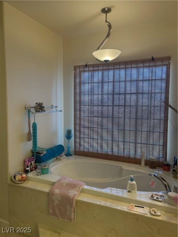 full bathroom featuring a garden tub