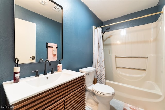 711 Sari Dr, Las Vegas, NV 89110 - bathroom with shower / tub combo, a textured wall, and vanity