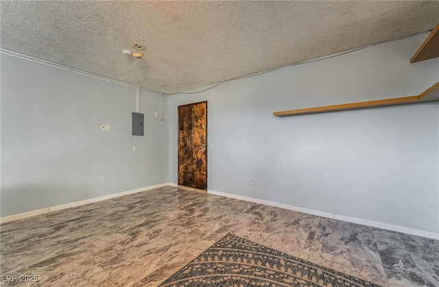 711 Sari Dr, Las Vegas, NV 89110 - spare room featuring electric panel and a textured ceiling