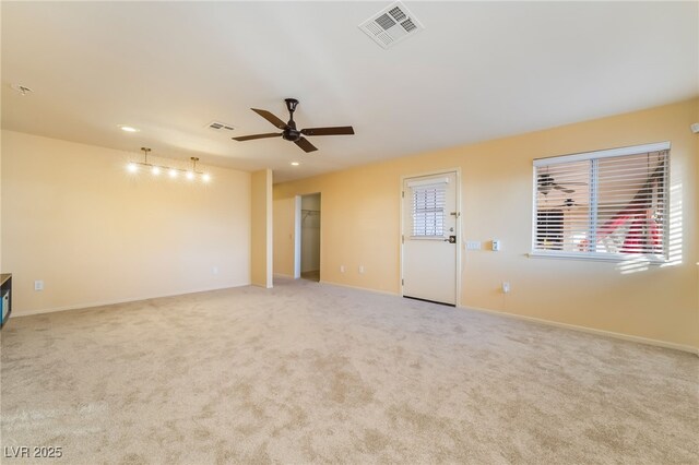 711 Sari Dr, Las Vegas, NV 89110 - unfurnished room featuring a ceiling fan, light colored carpet, and recessed lighting