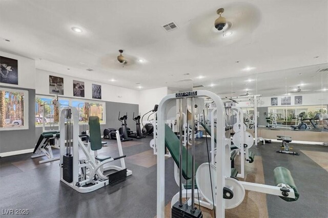 exercise room with visible vents, recessed lighting, and baseboards