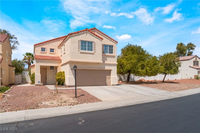 view of front of property with fence, stucco siding, an attached garage, and a tile roof