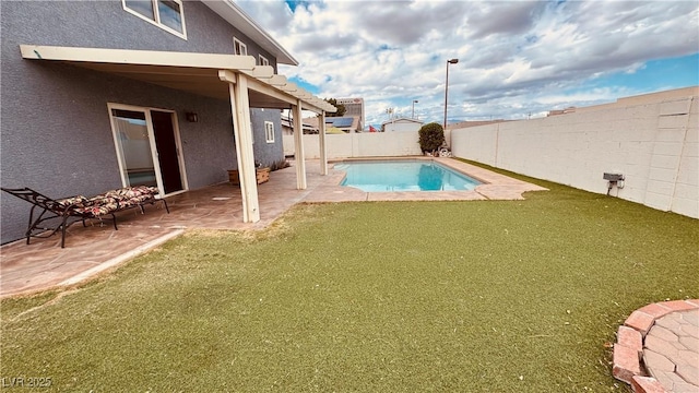 201 Redstone St, Las Vegas, NV 89145 - view of swimming pool featuring a fenced in pool, a fenced backyard, a yard, and a patio area