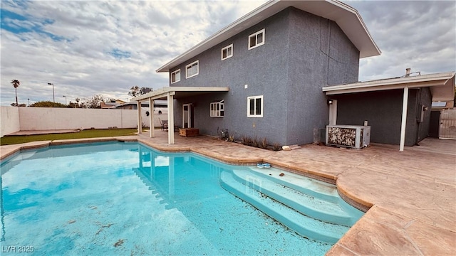 201 Redstone St, Las Vegas, NV 89145 - view of pool featuring a fenced in pool, a patio, and a fenced backyard
