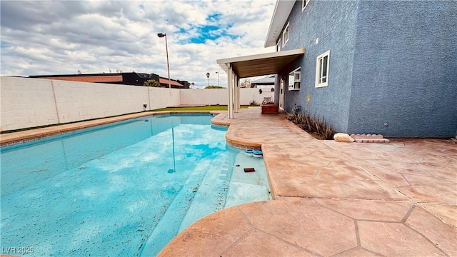 201 Redstone St, Las Vegas, NV 89145 - view of swimming pool featuring a patio, a fenced in pool, and a fenced backyard