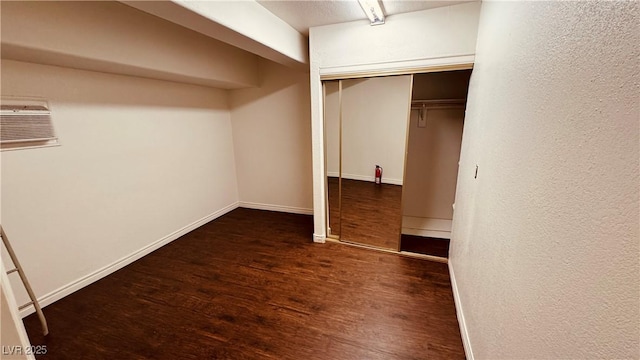 201 Redstone St, Las Vegas, NV 89145 - walk in closet with wood finished floors and a wall unit AC