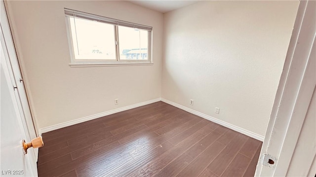 201 Redstone St, Las Vegas, NV 89145 - unfurnished bedroom featuring dark wood-type flooring and baseboards