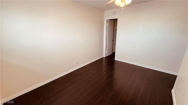201 Redstone St, Las Vegas, NV 89145 - spare room featuring baseboards, ceiling fan, and dark wood-style flooring