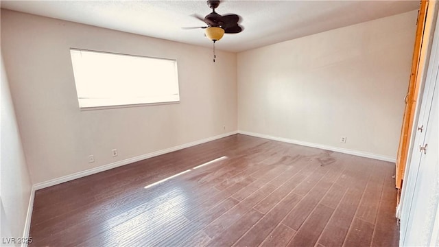 201 Redstone St, Las Vegas, NV 89145 - empty room with ceiling fan, wood finished floors, and baseboards