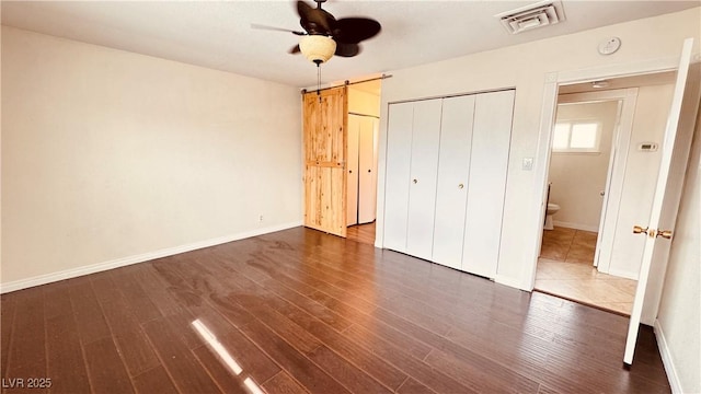 201 Redstone St, Las Vegas, NV 89145 - unfurnished bedroom featuring baseboards, visible vents, and dark wood-type flooring