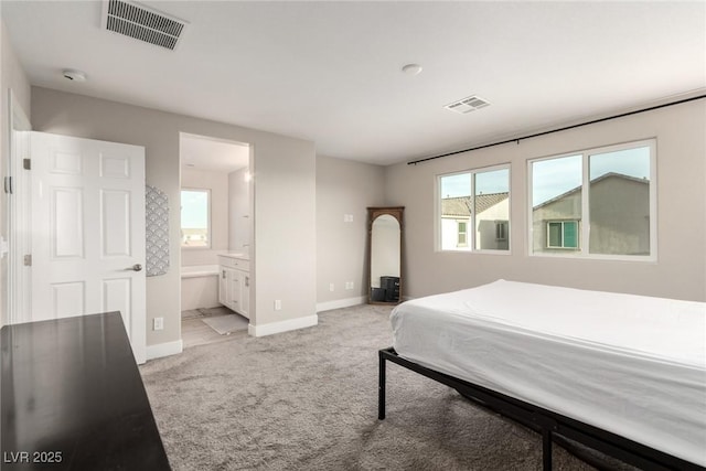 1049 Williamtown Ave, North Las Vegas, NV 89084 - bedroom featuring visible vents, multiple windows, and light colored carpet