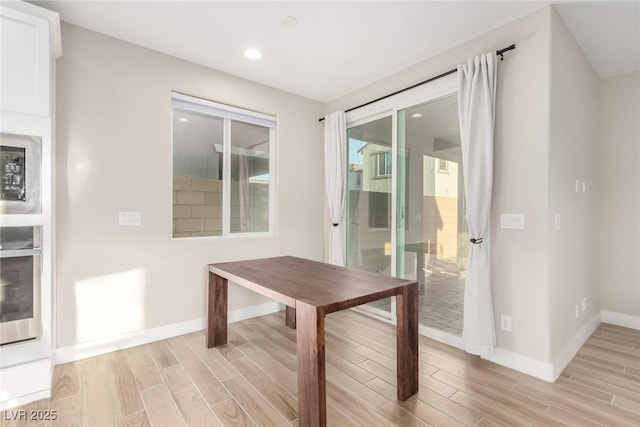 1049 Williamtown Ave, North Las Vegas, NV 89084 - dining room with recessed lighting, light wood-style flooring, and baseboards
