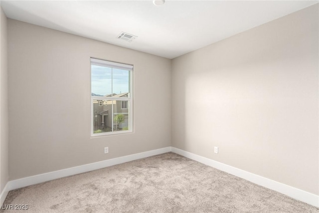 1049 Williamtown Ave, North Las Vegas, NV 89084 - spare room featuring visible vents, carpet floors, and baseboards
