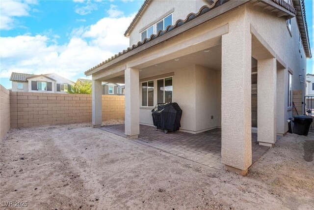 1049 Williamtown Ave, North Las Vegas, NV 89084 - view of patio / terrace with a fenced backyard and a grill