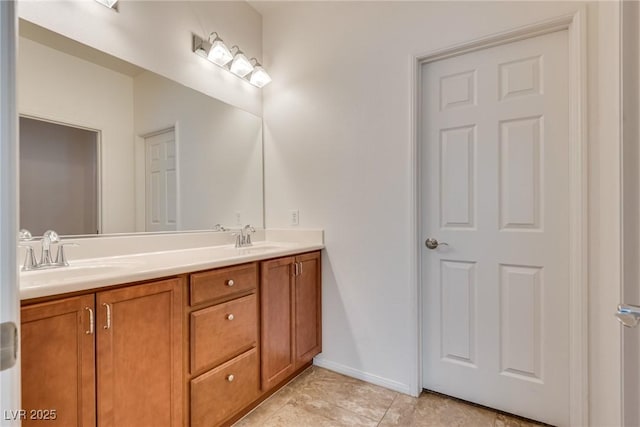 1139 Via Partito, Henderson, NV 89052 - bathroom with double vanity, tile patterned floors, and baseboards