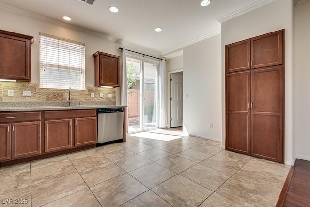 1139 Via Partito, Henderson, NV 89052 - kitchen featuring stainless steel dishwasher, a sink, crown molding, tasteful backsplash, and recessed lighting