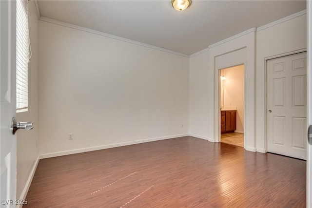 1139 Via Partito, Henderson, NV 89052 - unfurnished room with wood finished floors, ornamental molding, and baseboards