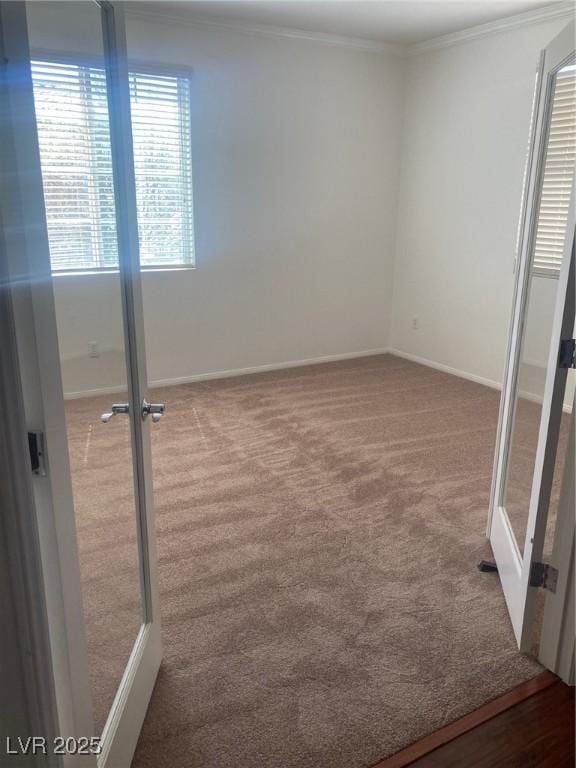 1139 Via Partito, Henderson, NV 89052 - carpeted empty room with ornamental molding and baseboards