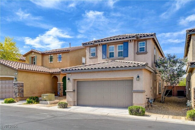 8626 Anderson Dale Ave, Las Vegas, NV 89178 - view of front facade with stucco siding, a tile roof, and driveway