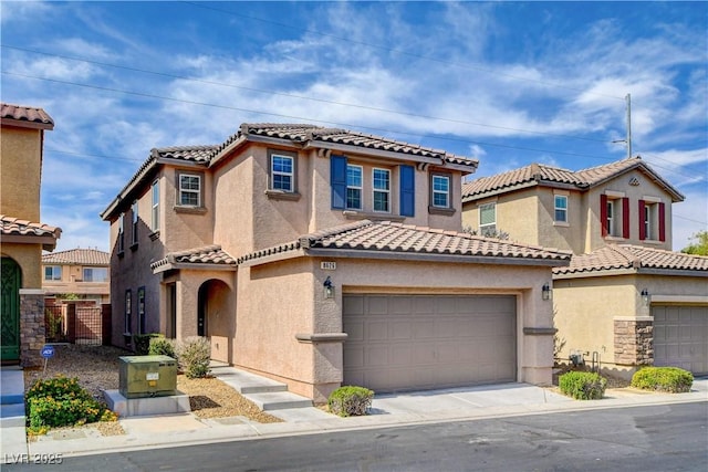 8626 Anderson Dale Ave, Las Vegas, NV 89178 - mediterranean / spanish house featuring a tile roof, stucco siding, and a garage