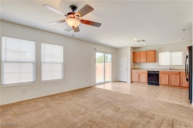 8626 Anderson Dale Ave, Las Vegas, NV 89178 - kitchen with black appliances, a sink, light countertops, open floor plan, and a ceiling fan