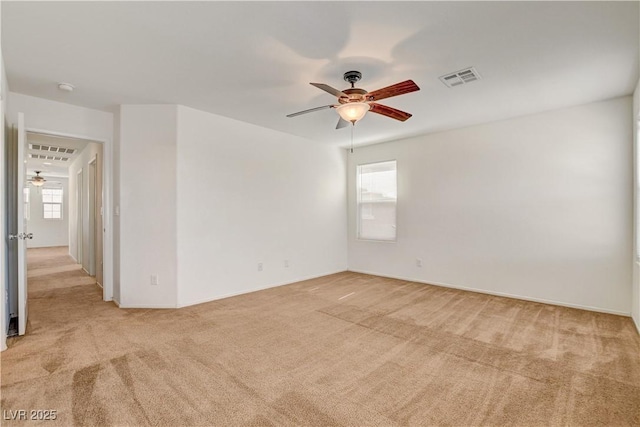 8626 Anderson Dale Ave, Las Vegas, NV 89178 - unfurnished room featuring ceiling fan, light colored carpet, and healthy amount of natural light