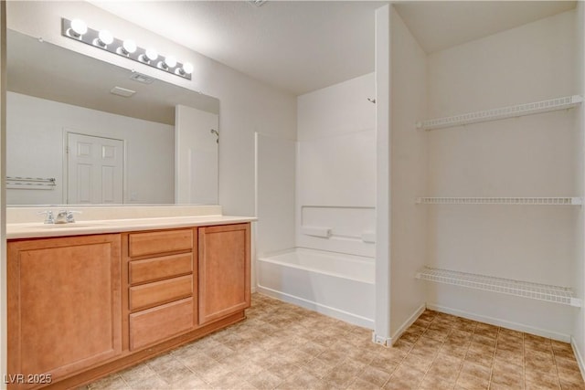 8626 Anderson Dale Ave, Las Vegas, NV 89178 - full bath featuring vanity, bathtub / shower combination, baseboards, and tile patterned floors