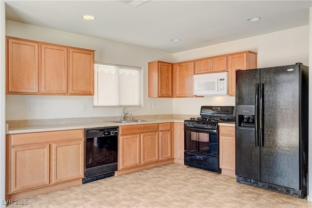8626 Anderson Dale Ave, Las Vegas, NV 89178 - kitchen featuring black appliances, light brown cabinetry, a sink, and recessed lighting