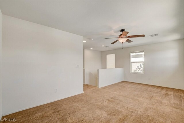 8626 Anderson Dale Ave, Las Vegas, NV 89178 - unfurnished room with light carpet, a ceiling fan, recessed lighting, and baseboards