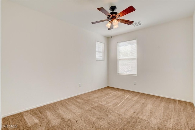 8626 Anderson Dale Ave, Las Vegas, NV 89178 - spare room featuring light colored carpet, a ceiling fan, and baseboards