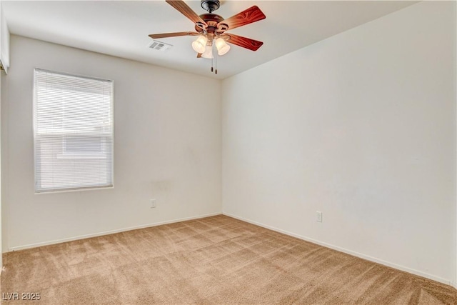8626 Anderson Dale Ave, Las Vegas, NV 89178 - spare room featuring light carpet, baseboards, and ceiling fan