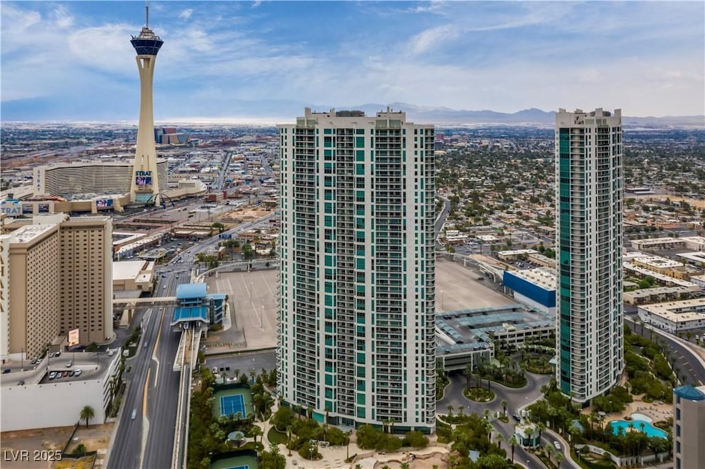 property's view of city featuring a mountain view