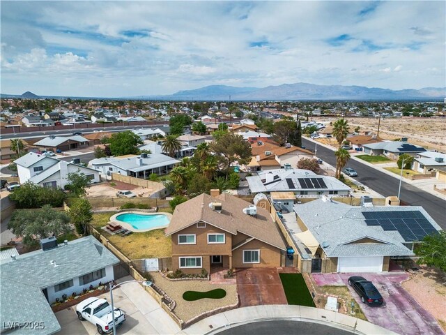 aerial view featuring a mountain view and a residential view