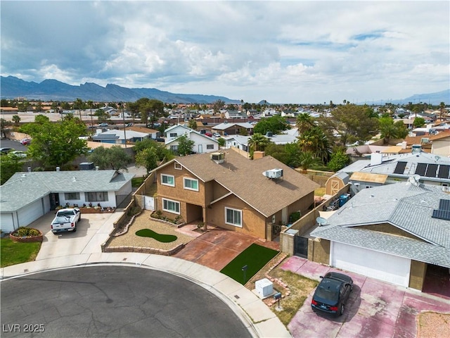 aerial view featuring a residential view and a mountain view