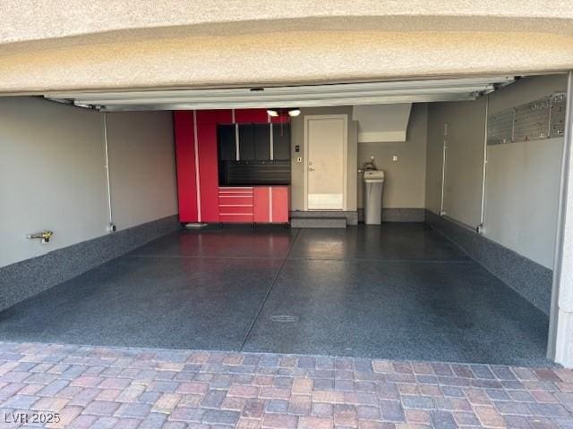 garage with baseboards