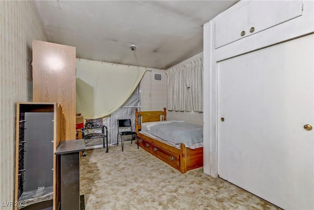 bedroom featuring carpet and visible vents