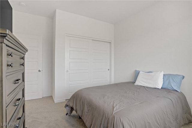 4436 Mural Glen Ct, North Las Vegas, NV 89084 - bedroom with light colored carpet, baseboards, and a closet