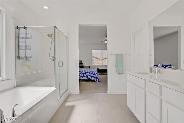 4436 Mural Glen Ct, North Las Vegas, NV 89084 - bathroom featuring ensuite bathroom, baseboards, ceiling fan, and a stall shower