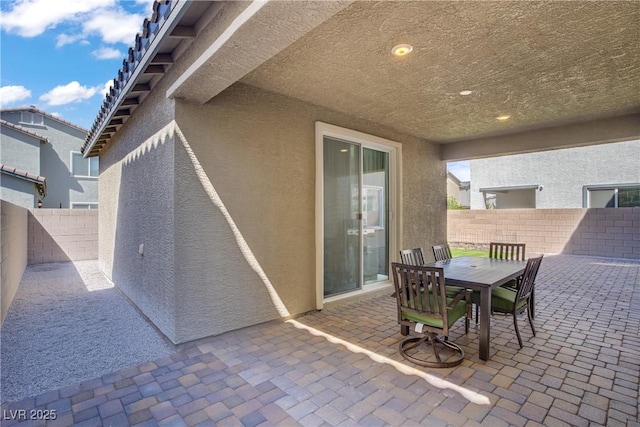 4436 Mural Glen Ct, North Las Vegas, NV 89084 - view of patio / terrace with outdoor dining area and a fenced backyard