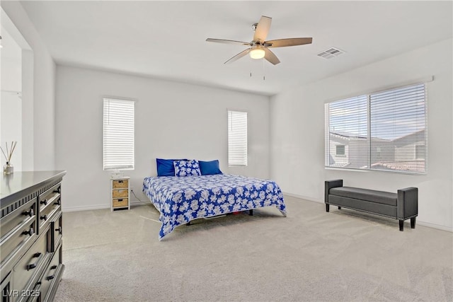 4436 Mural Glen Ct, North Las Vegas, NV 89084 - carpeted bedroom featuring baseboards, visible vents, and multiple windows