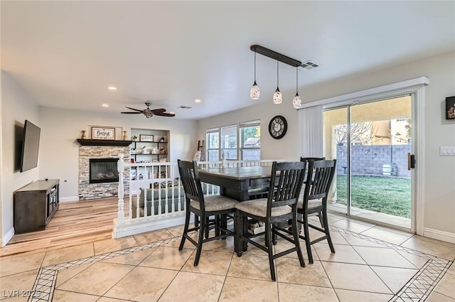 dining area with a ceiling fan, visible vents, light tile patterned floors, baseboards, and recessed lighting