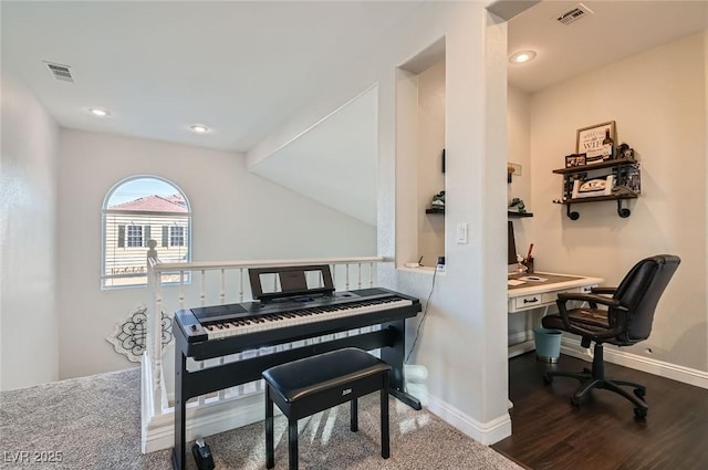 office featuring visible vents, baseboards, and dark wood-style floors