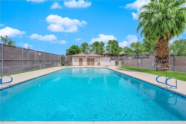 view of pool featuring fence, a fenced in pool, and a patio